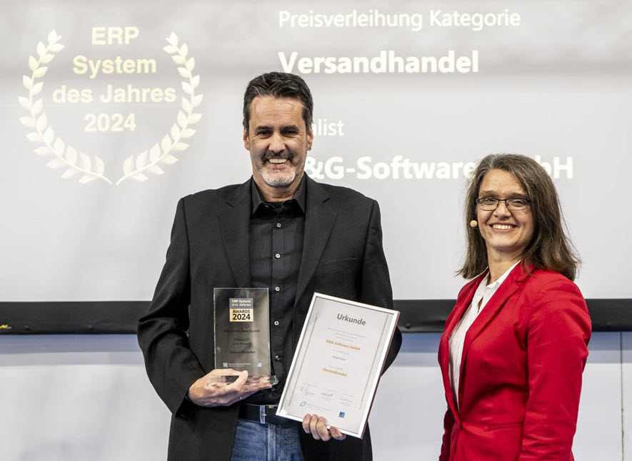 Andreas Brenk, CEO D&G-Software, nimmt den Award entgegen.